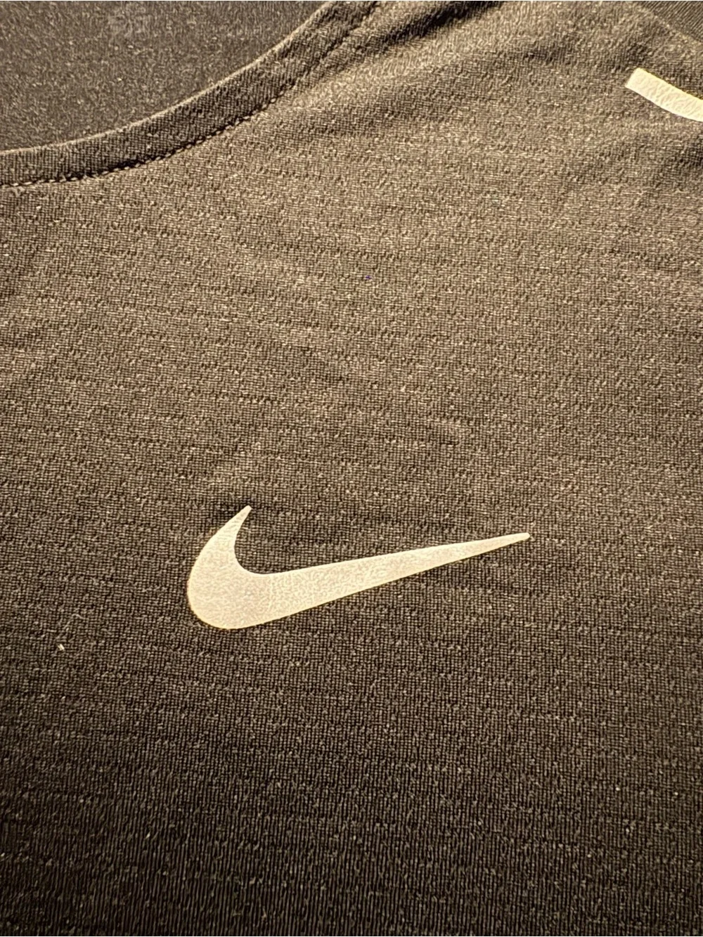 Nike Black Short-Sleeve Athletic Tee with Reflective Swoosh